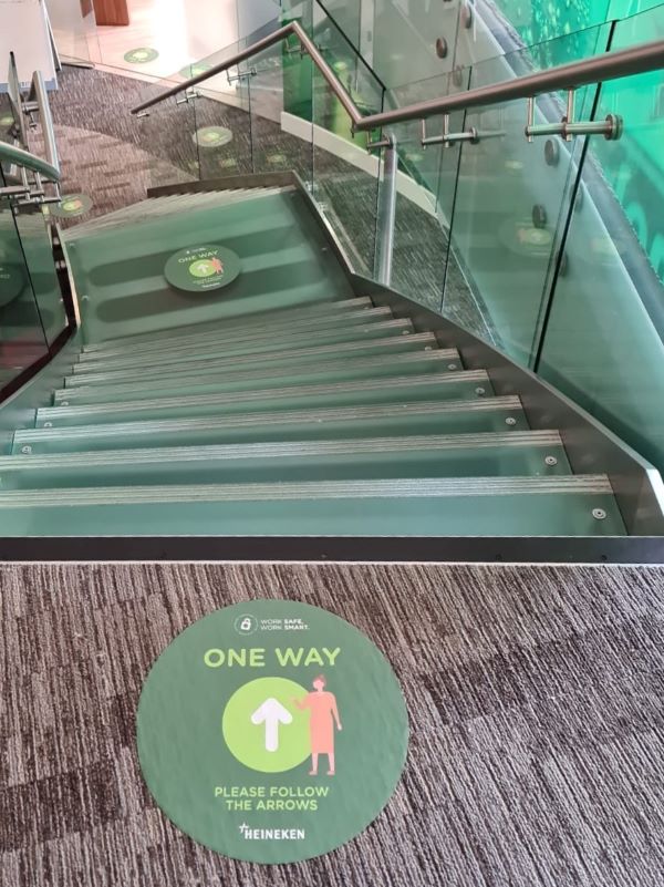 Heineken stairwell with directional stickers