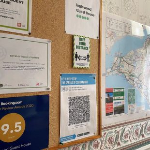 Noticeboard featuring NHS Test and Trace QR Code at Inglewood guesthouse